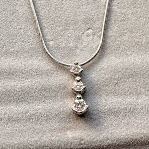 Gorgeous white gold with diamond drop pendant. See photo for full description.